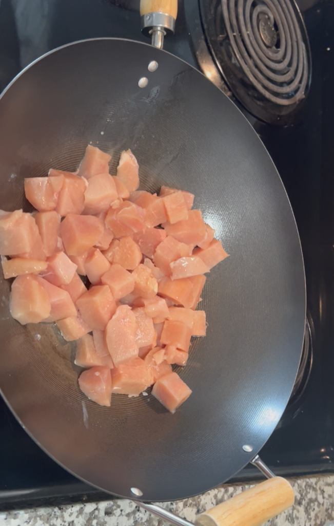 Raw chicken in the pan