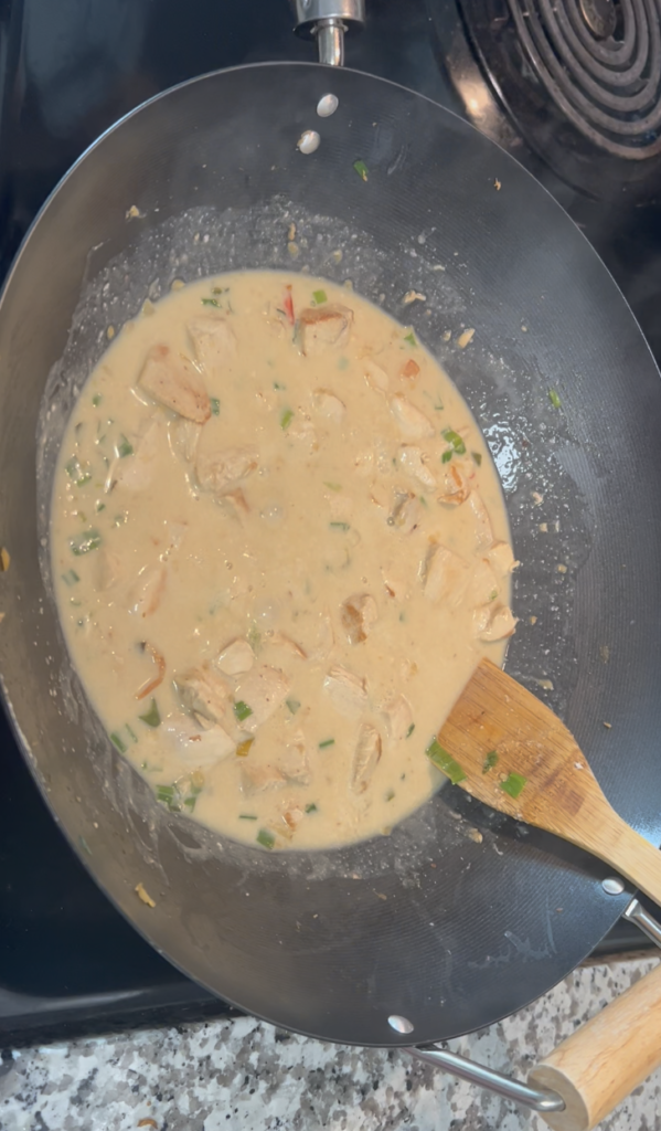 Simmering chicken curry